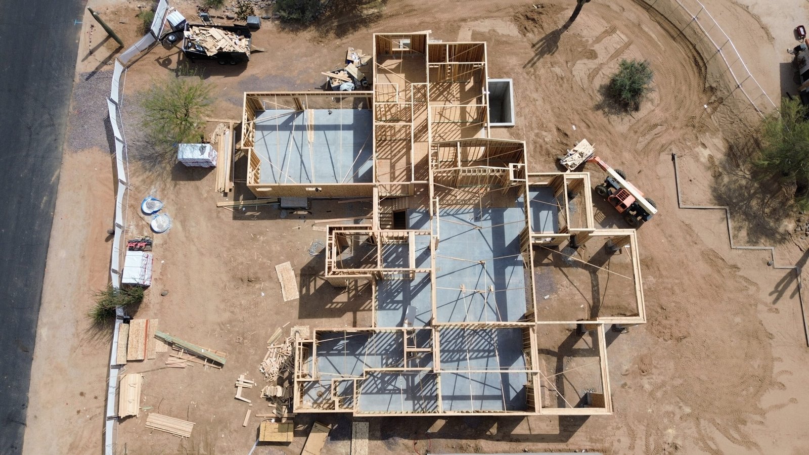 Aerial drone view of residential home framing project in Arizona