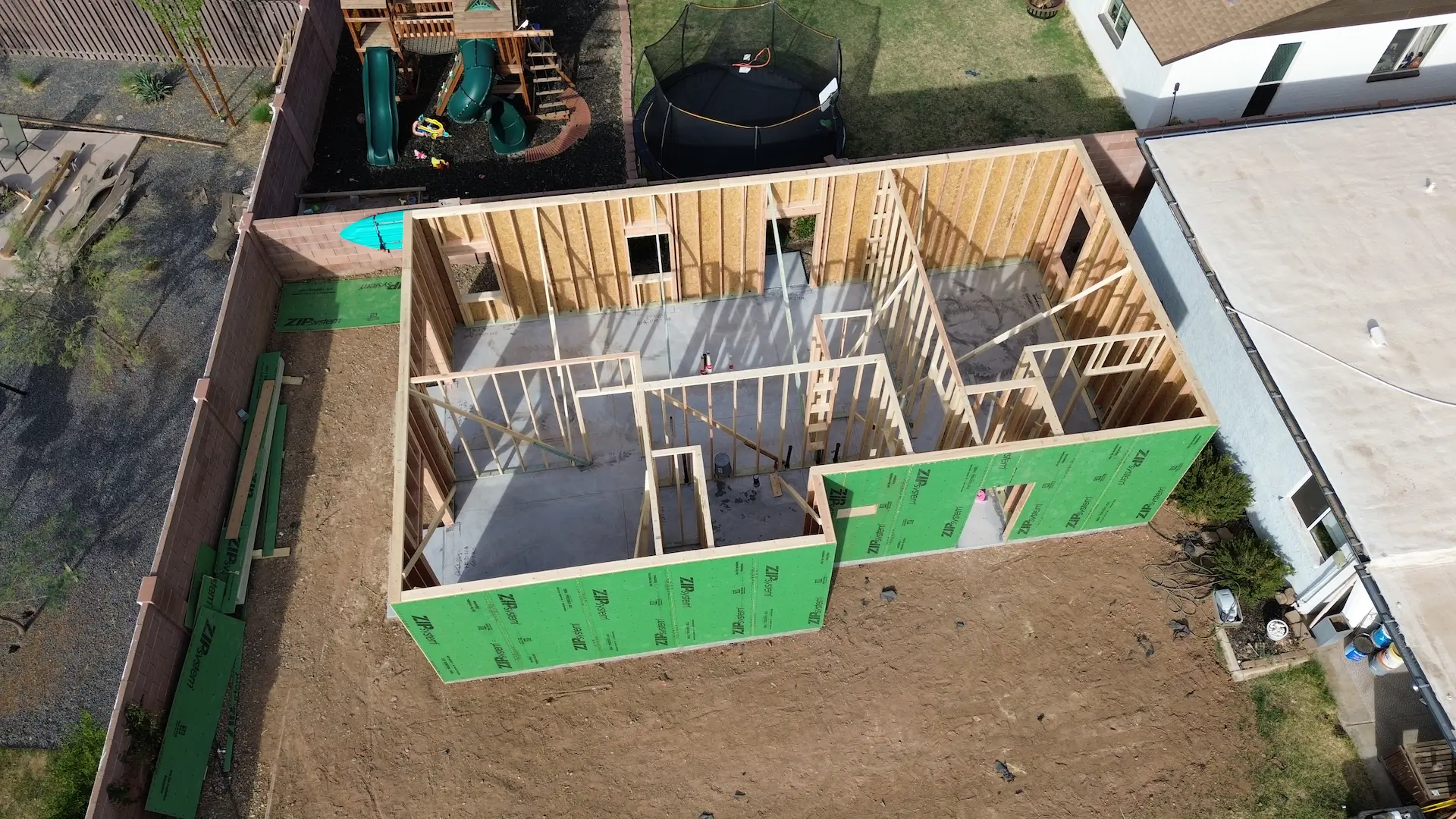 Drone view of a home addition under construction in Apache Junction, AZ by Cowboy's General Construction.